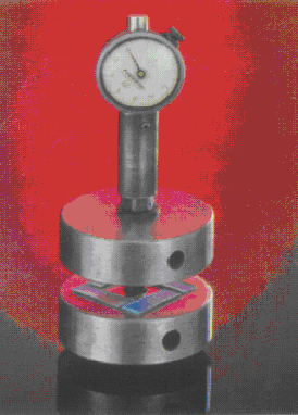 What is the role of a test machine in quality control?